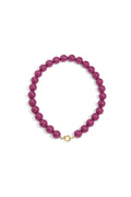 Kralenketting met fuchsia paars grote kralen en rond gouden slot 