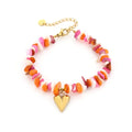 Armband met kralen en hartjes bedel in het oranje