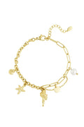 Schakelarmband bedels schelpen, zeesterren en parels goudkleurig