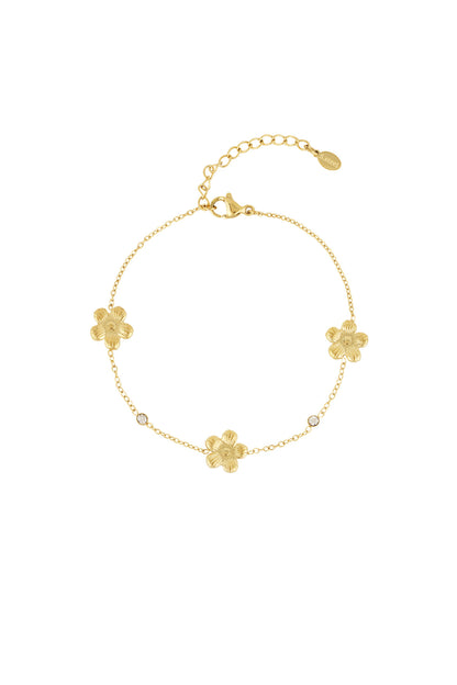 Armband met bloemetjes en glitters in het goud