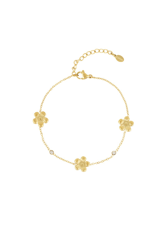 Armband met bloemetjes en glitters in het goud