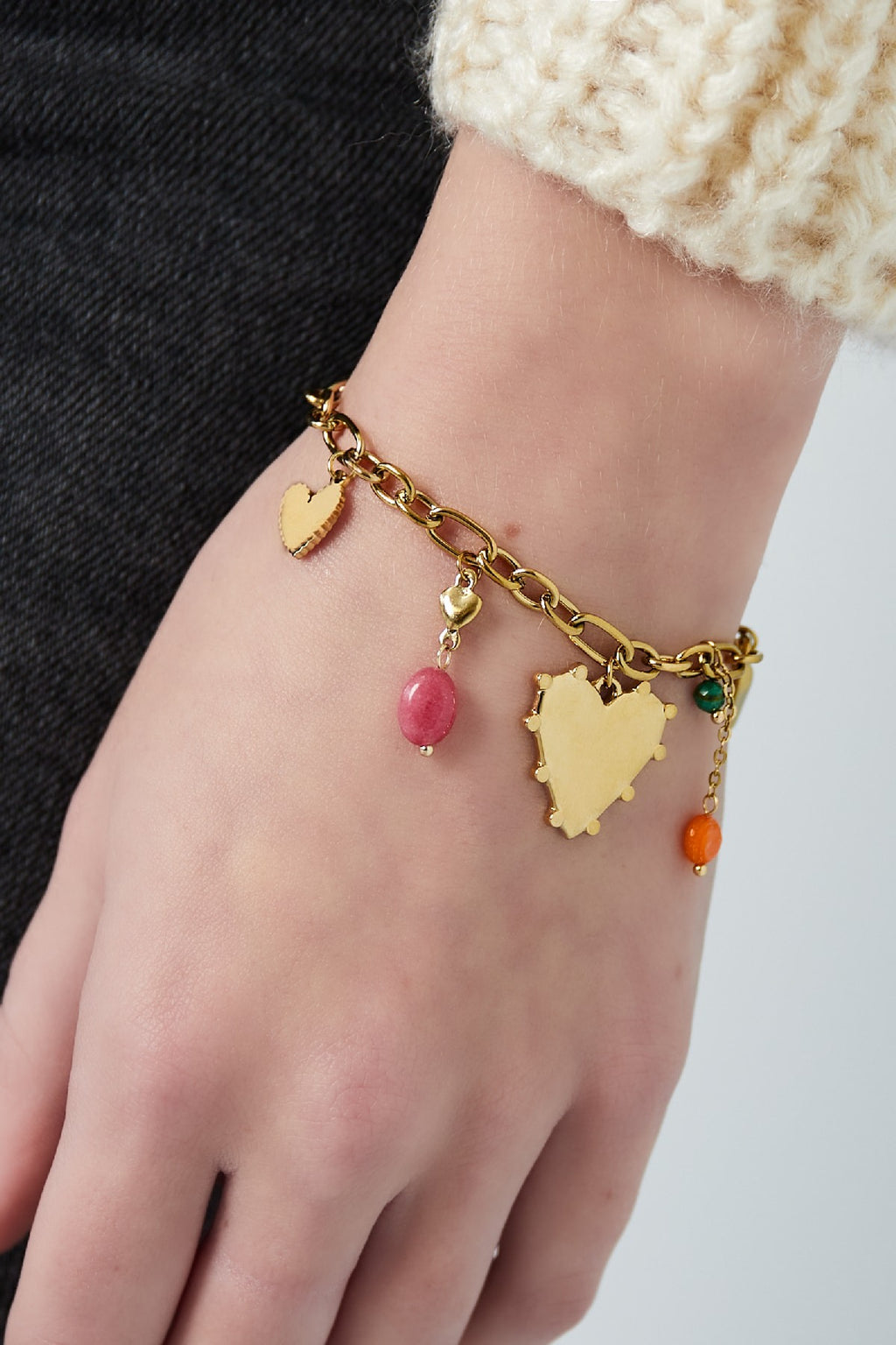 Schakelketting goud stainless steel met hartjes bedels