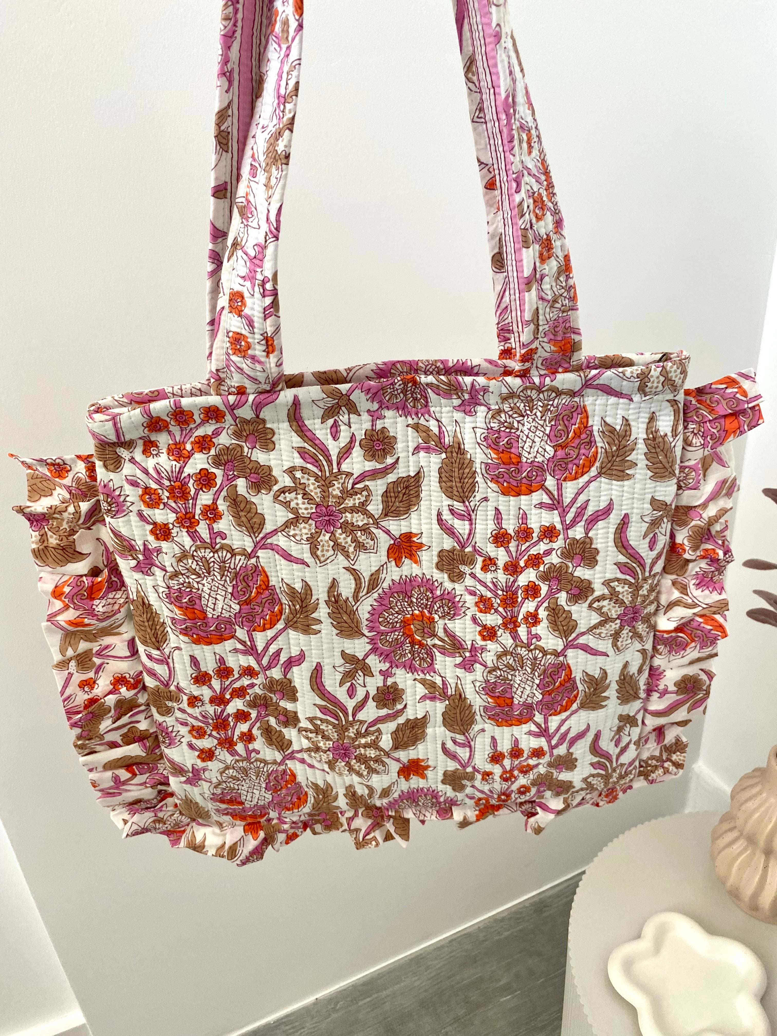 Tas met witte en roze bloemenprint en ritssluiting
