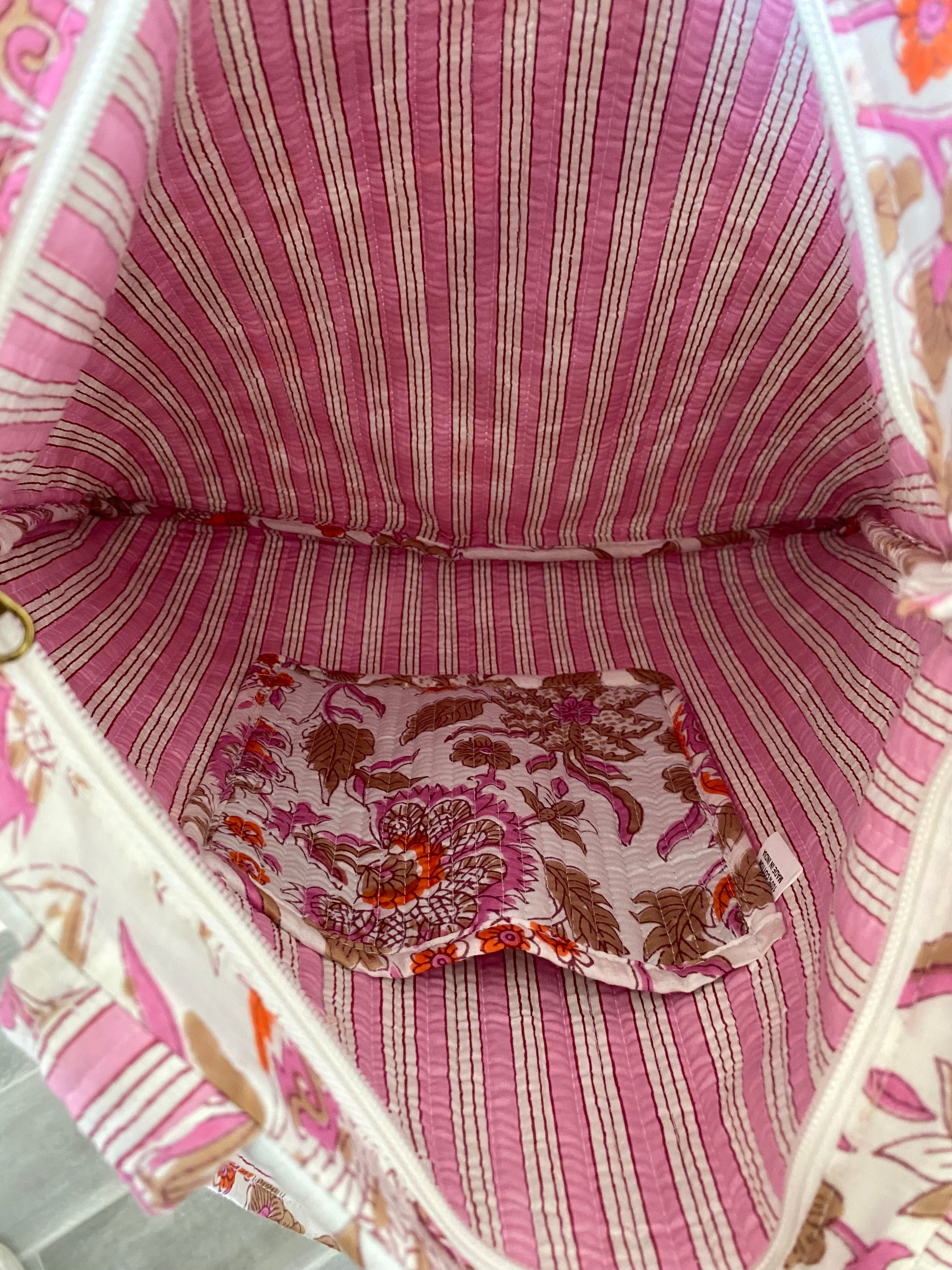 Tas met witte en roze bloemenprint en ritssluiting